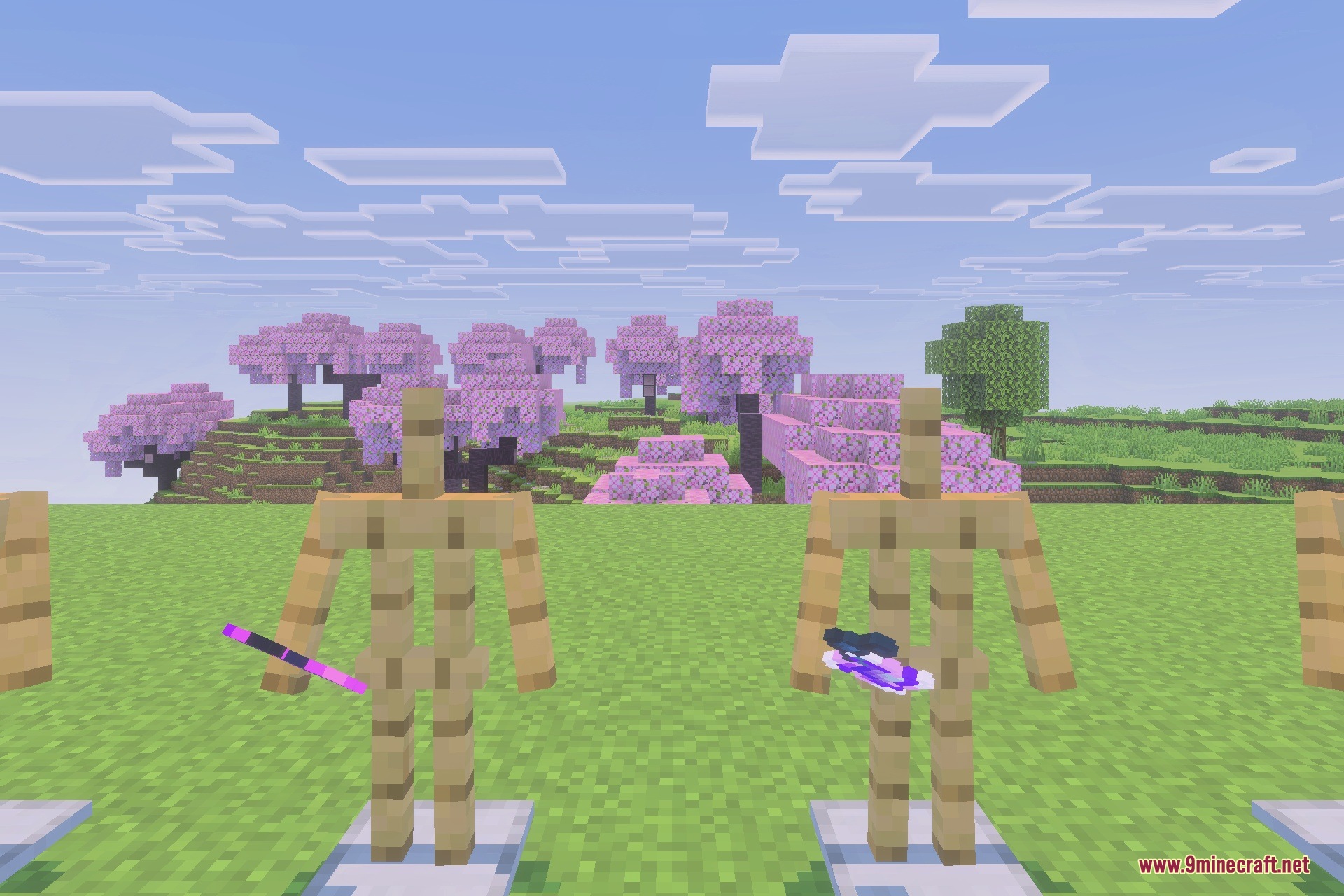 Two wooden armor stands displaying a purple wand and a magical spell item