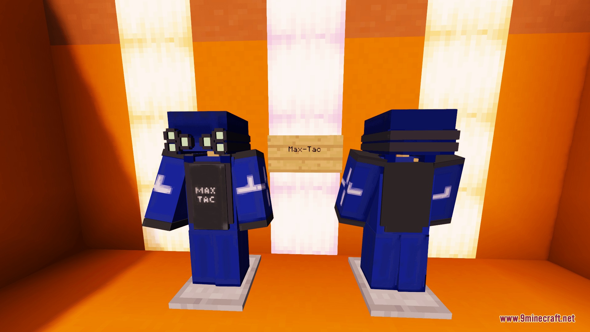 Two sets of blue MAX TAC armor displayed on stands in Minecraft