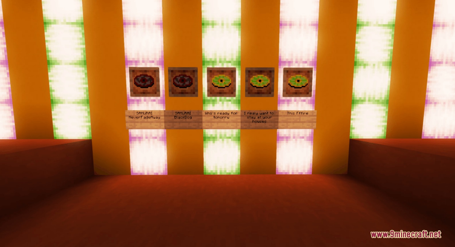 Five music discs in item frames with signs on a glowing neon wall