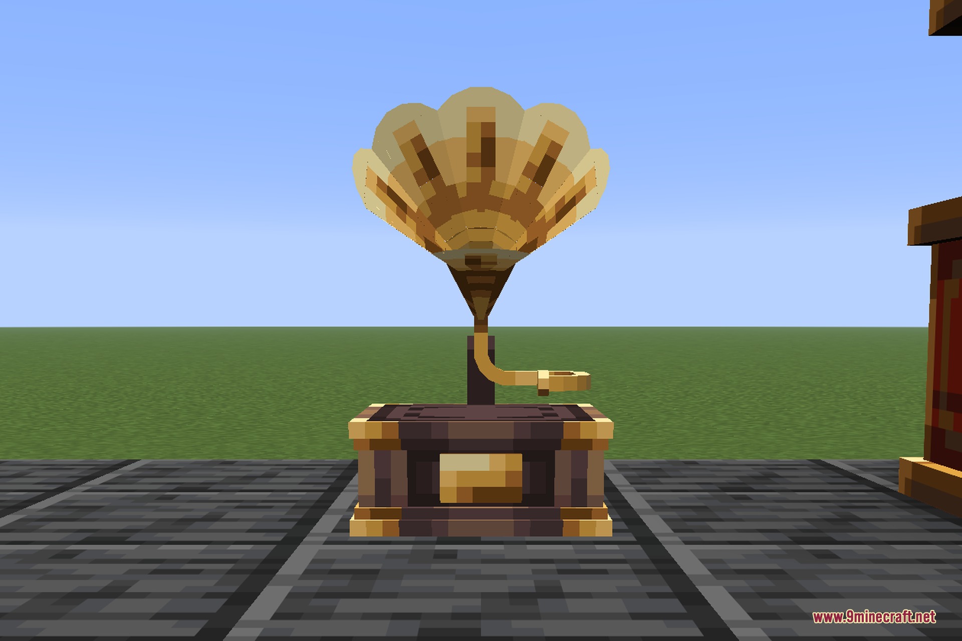 NetEase Cloud Music 9minecraft Mod Screenshot 3 A decorative music player block with a large golden horn in Minecraft