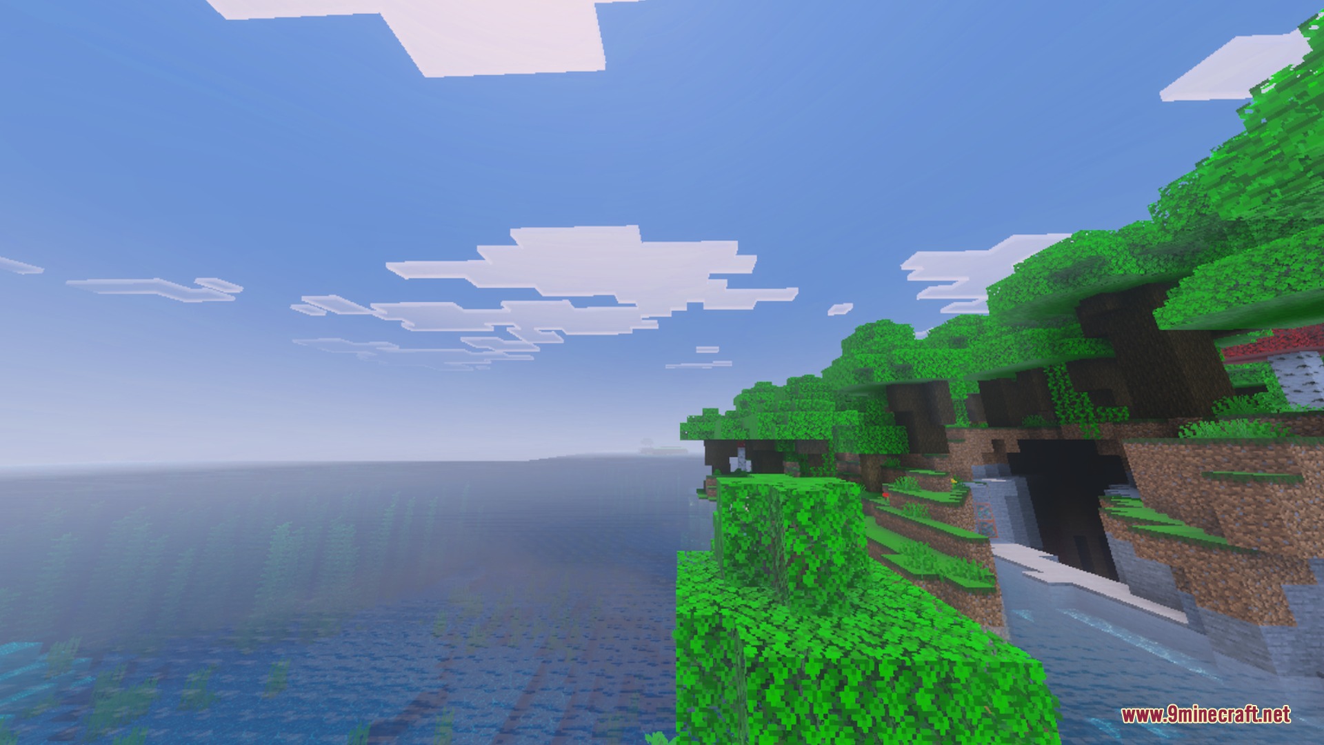 Nether's Optimizer+ Shader Screenshot 1 Lush green cliffs and clear blue water under a bright Minecraft sky