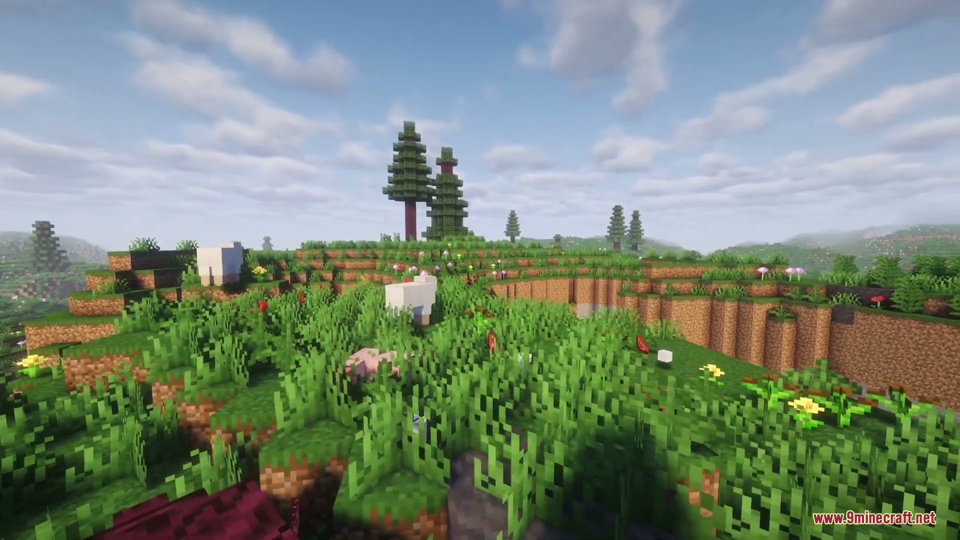 Nomad Horizon Expanded Mod Screenshot 6 A scenic view of a grassy hill with sheep and a prehistoric creature