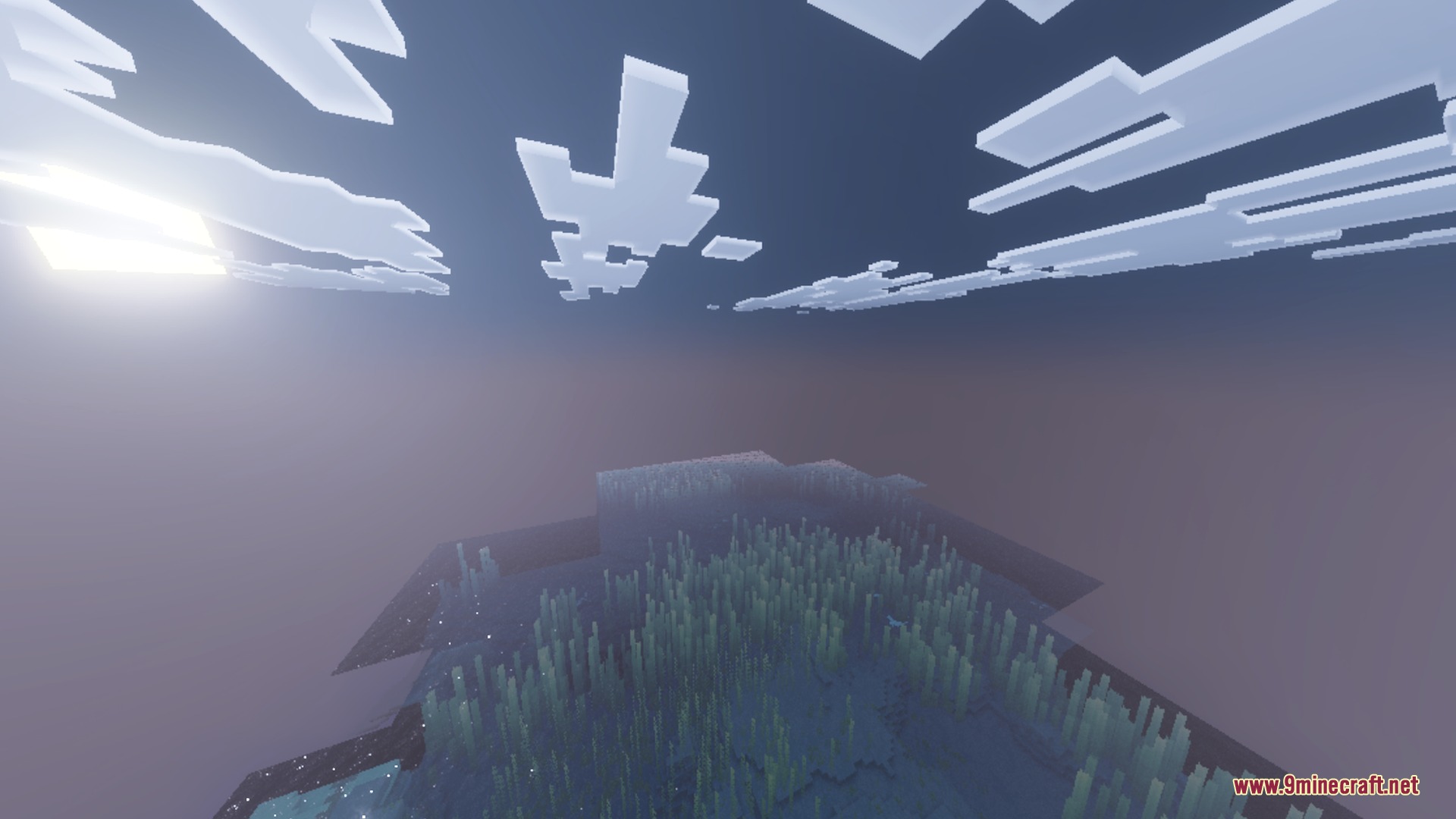 Clear water reflections and atmospheric fog enhance the look of the ocean
