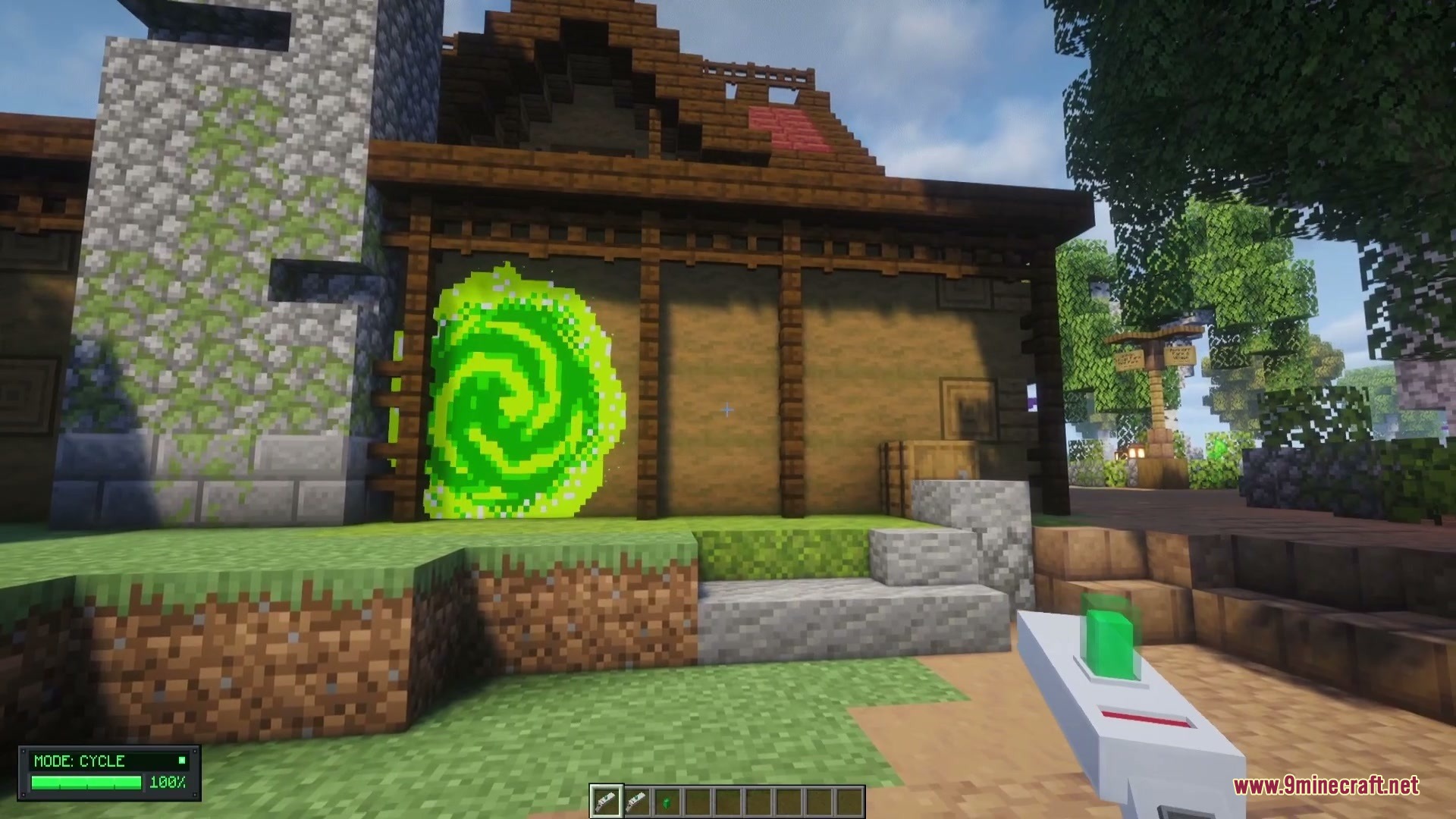 Omni Gear Collection Mod Screenshot 1 Player shooting a green swirling portal onto a wooden house wall