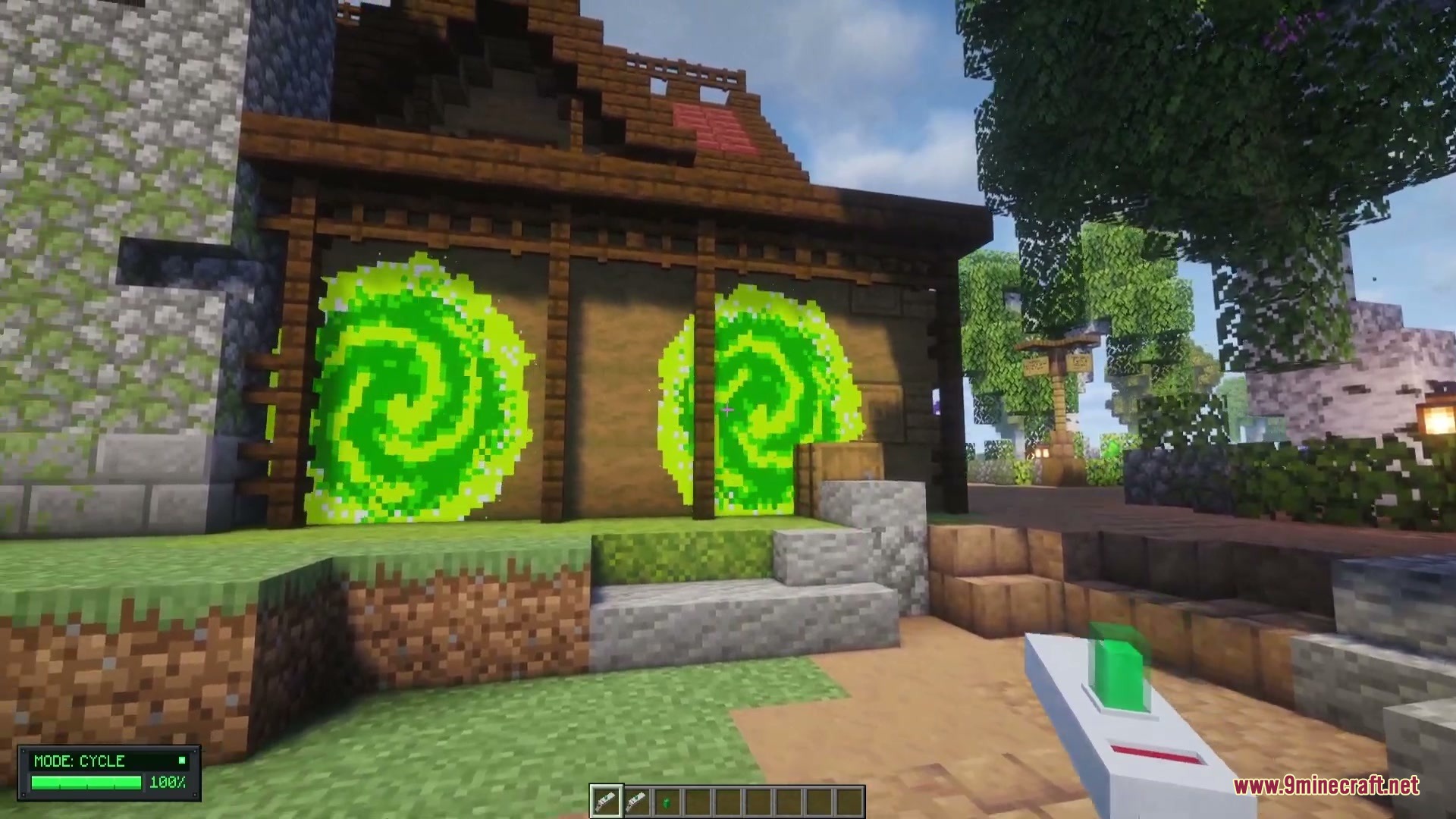 Omni Gear Collection Mod Screenshot 2 Two green portals are active on the side of a wooden building