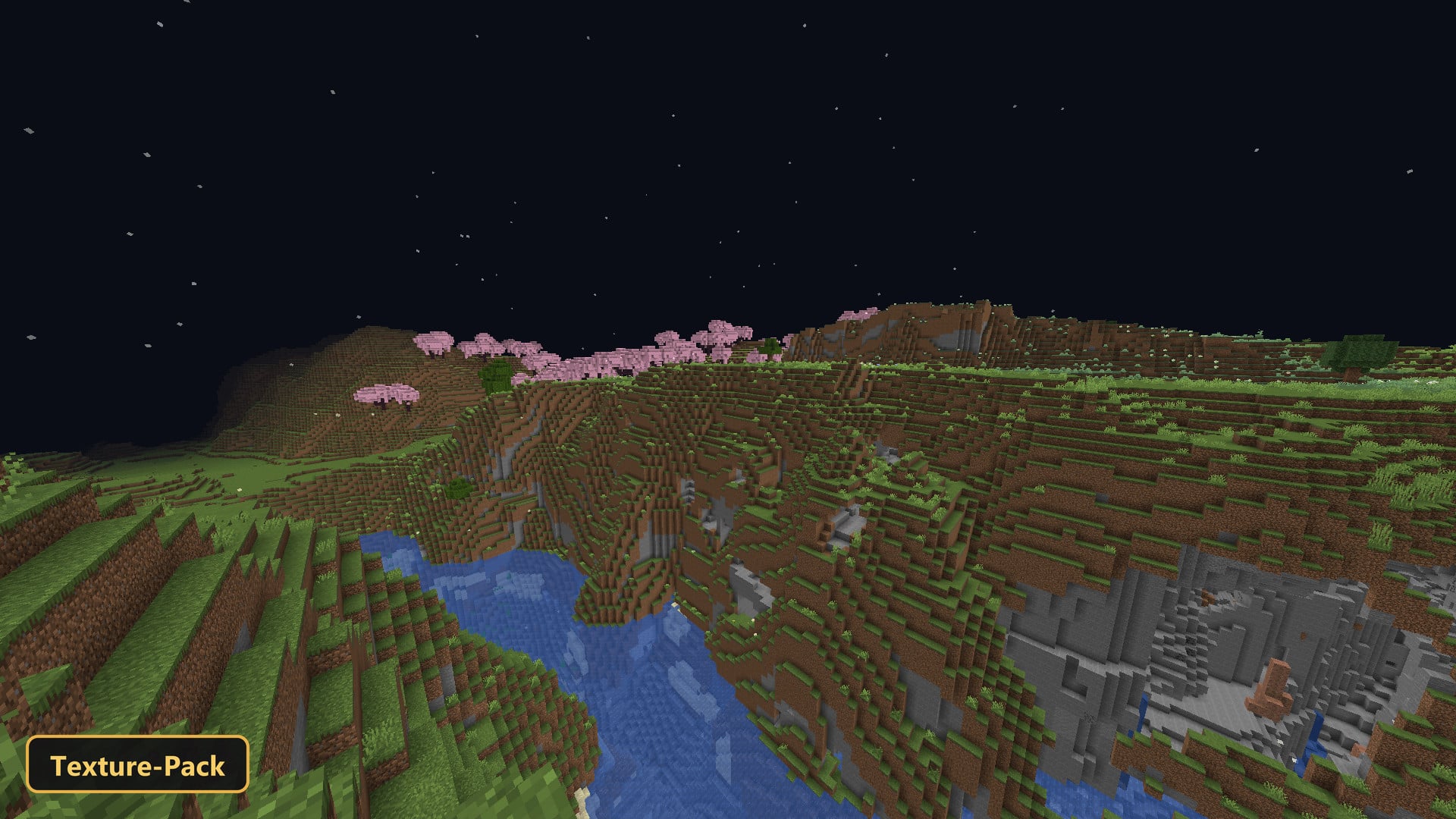 night scene over a river valley with pink cherry trees