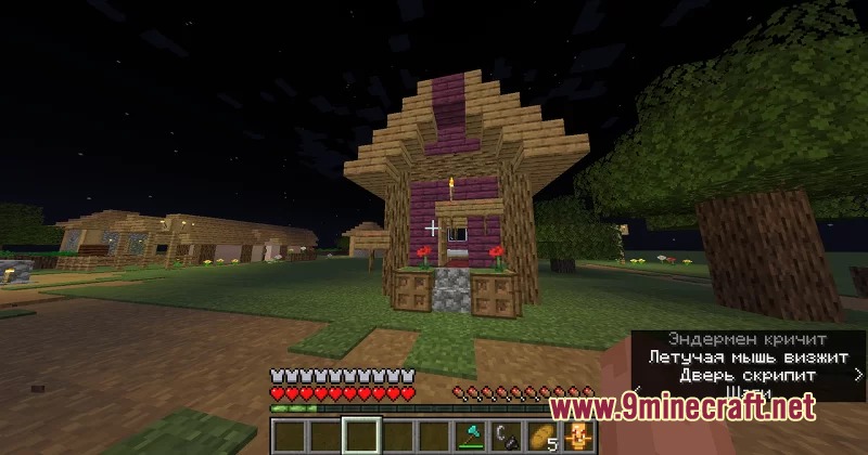Phobic Threshold Threshold Mod Screenshot 3 A player explores a village at night with a custom totem in hand