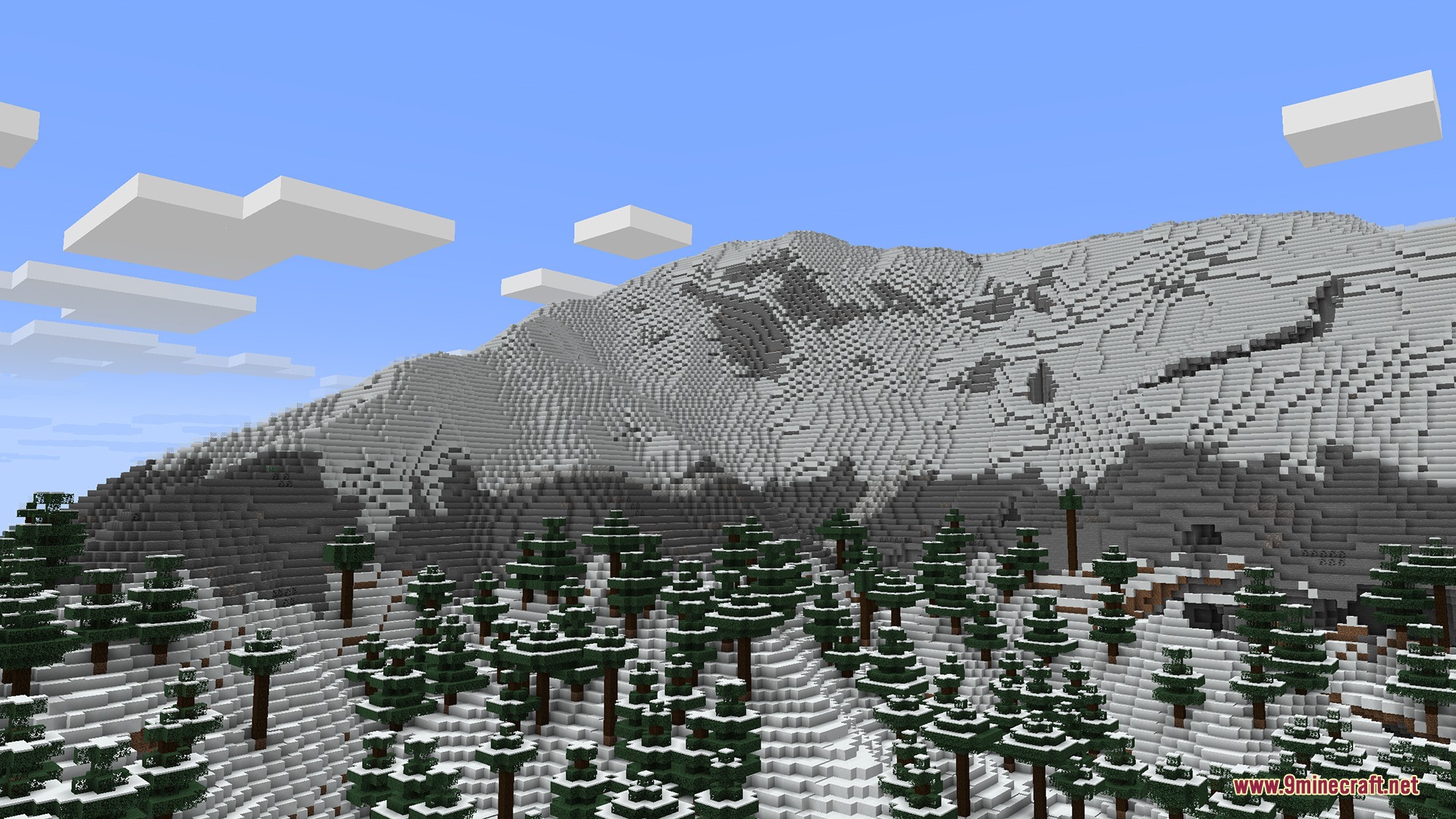Pixel Canvas Terrain Mod Screenshot 1 A massive snowy mountain peak with pine trees at the base
