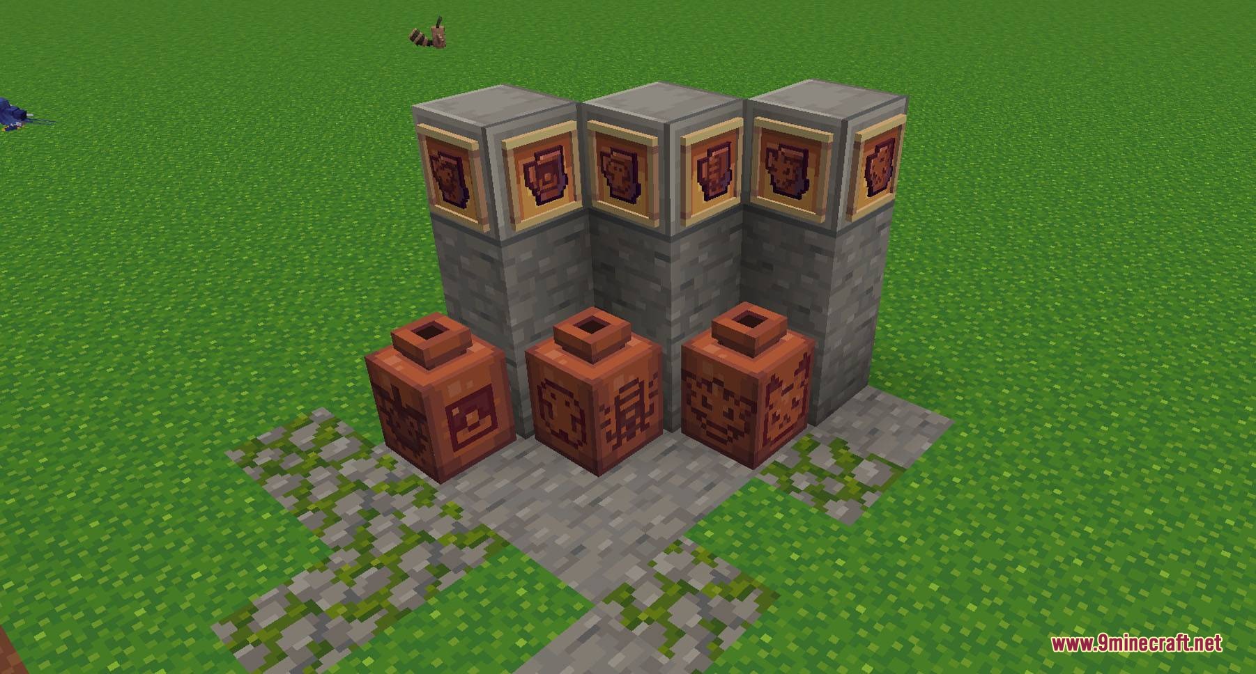 Pixellated Pocket Spirits Resource Pack Screenshot 5 Pottery sherds and decorated pots displayed on stone walls in a field