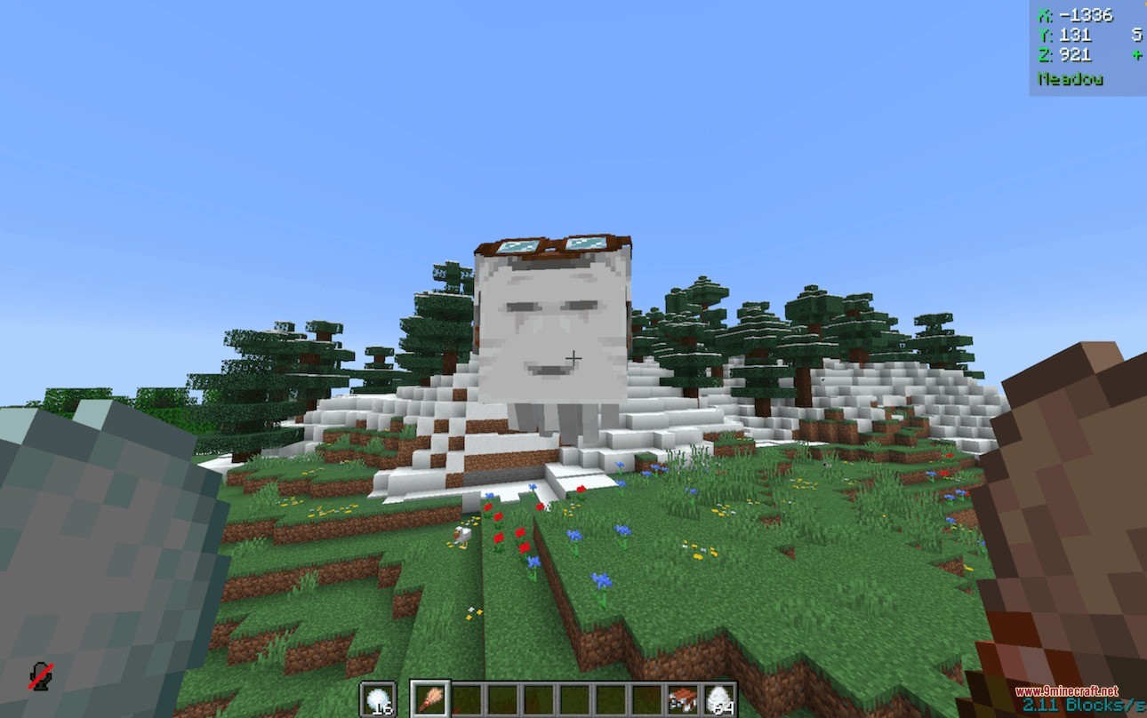 A small Happy Ghast with goggles floating near a snowy forest landscape