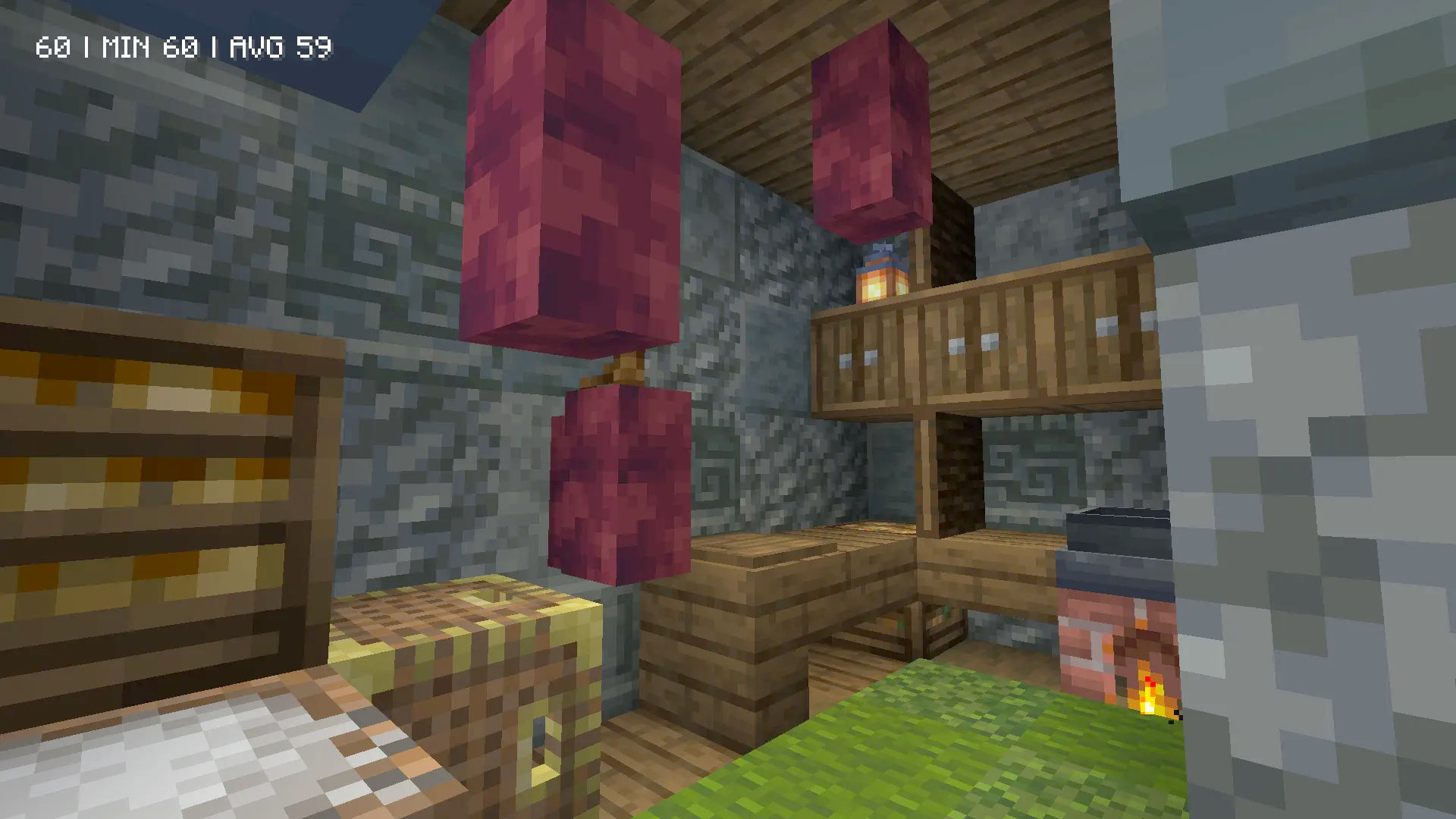 Interior of a wooden house with storage shelves and a warm fireplace