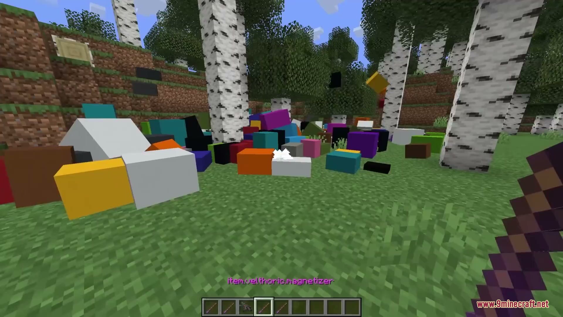 Primal Aether Surge Mod Screenshot 6 A large pile of colorful physics blocks scattered across a birch forest floor