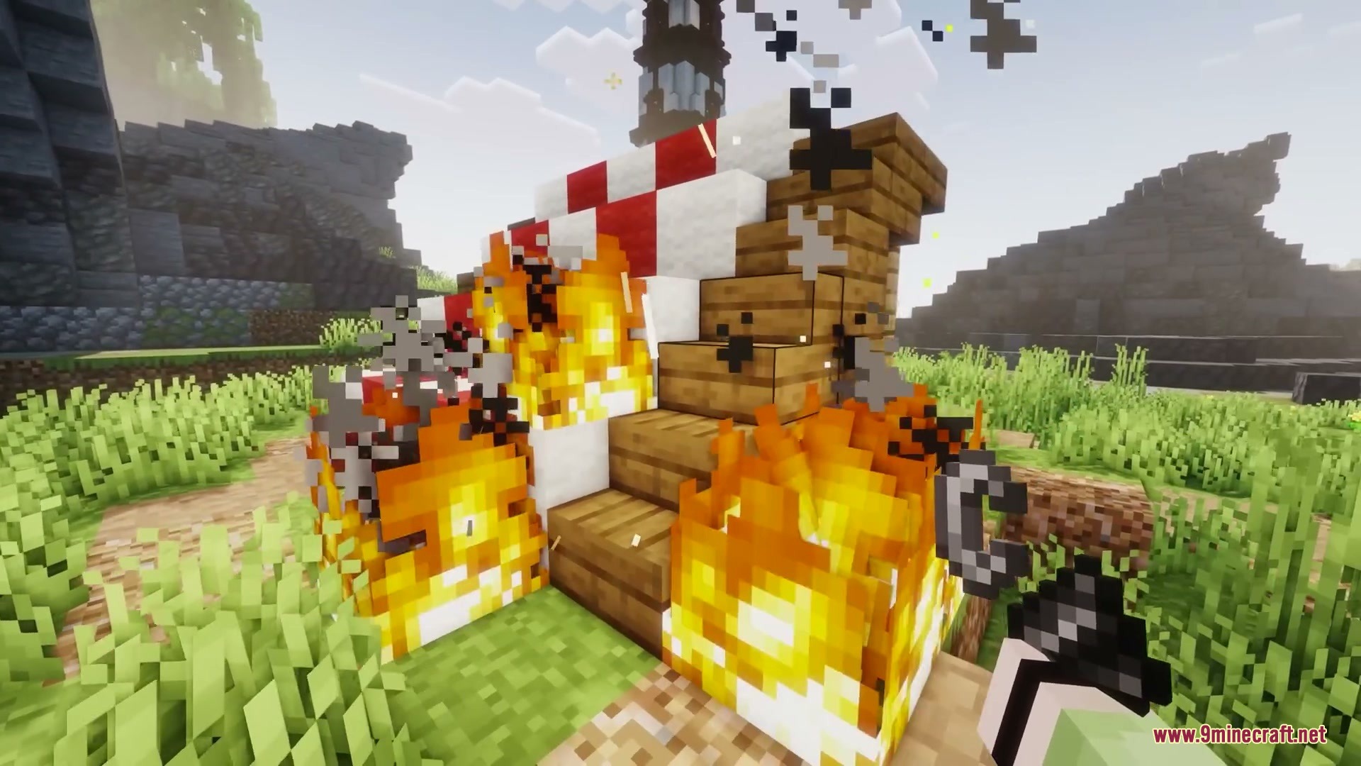 Primal Appetite Mod Screenshot 10 A player sets a small wooden structure on fire using flint and steel