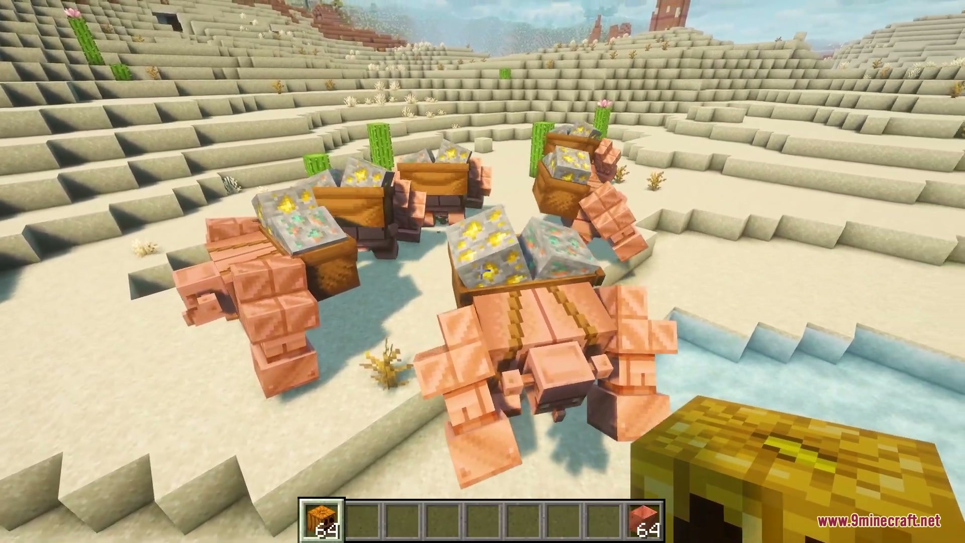 Primal Appetite Mod Screenshot 3 Copper golems carrying chests filled with gold ore blocks in a desert