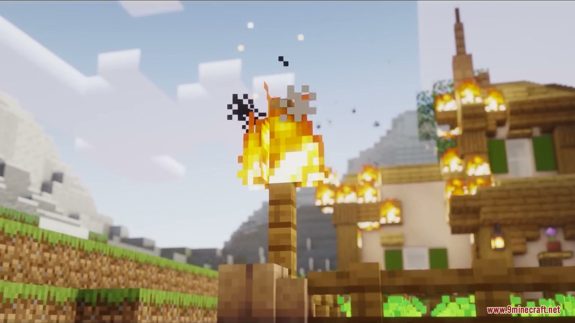 Primal Appetite Mod Screenshot 8 A wooden house is burning with flames and smoke in a village