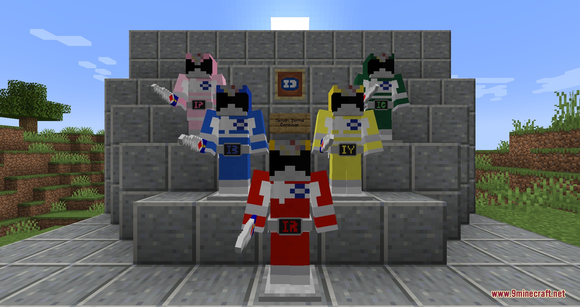 Five Super Sentai heroes in colorful armor posing on a stone structure