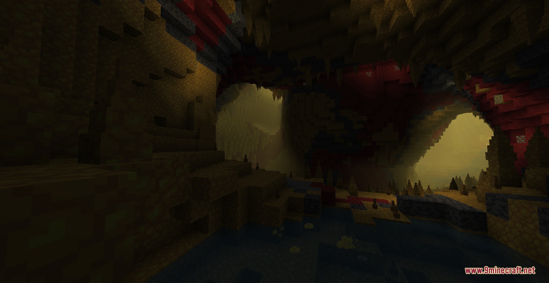Prismatic Atmosphere Resource Pack Screenshot 7 Dusty yellow mist fills a dark cavern with sharp stalactites and stalagmites