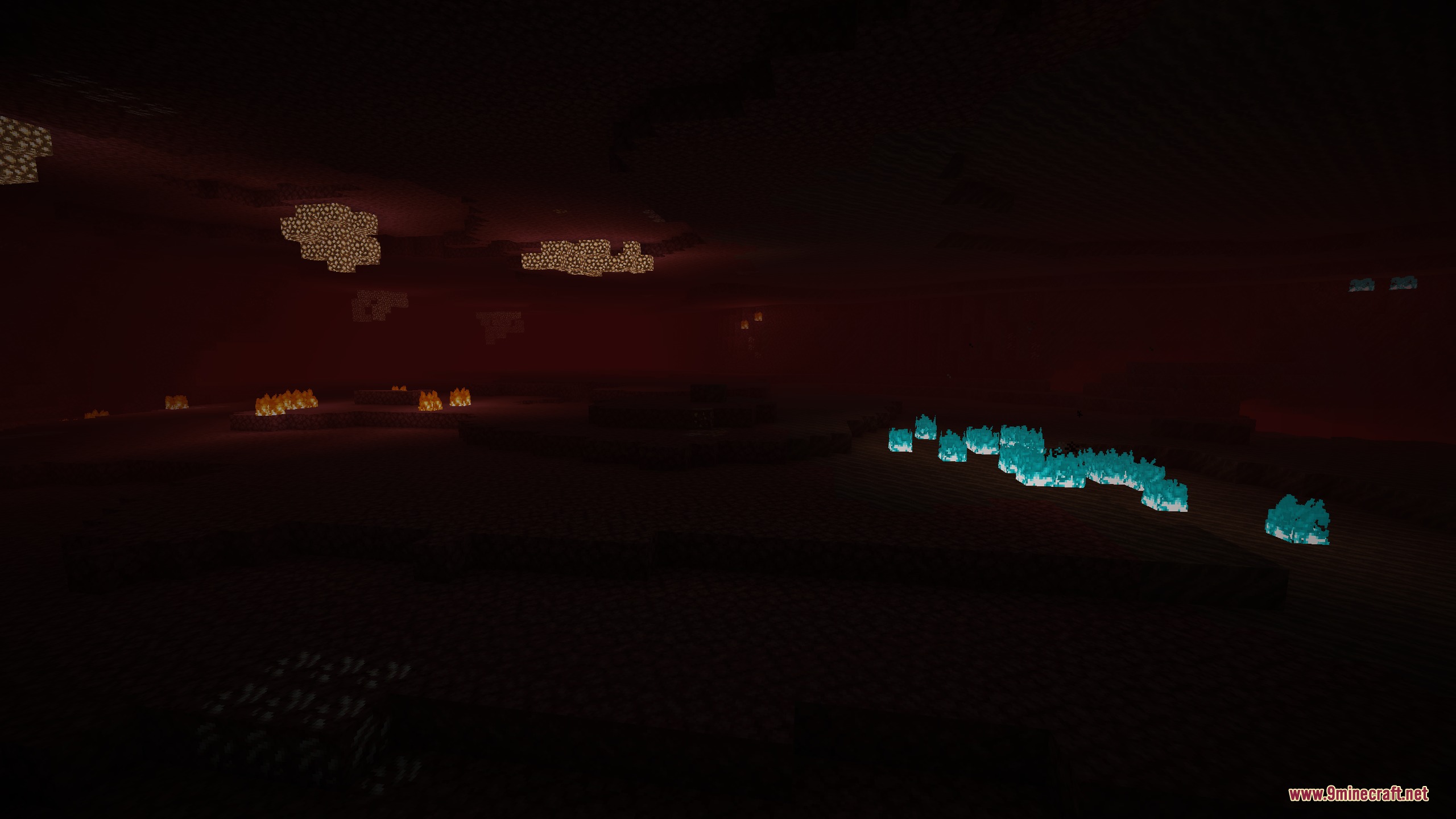 Prismatic Bloom Aura Mod Screenshot 5 Blue soul fire and glowstone blocks illuminate the dark Nether landscape
