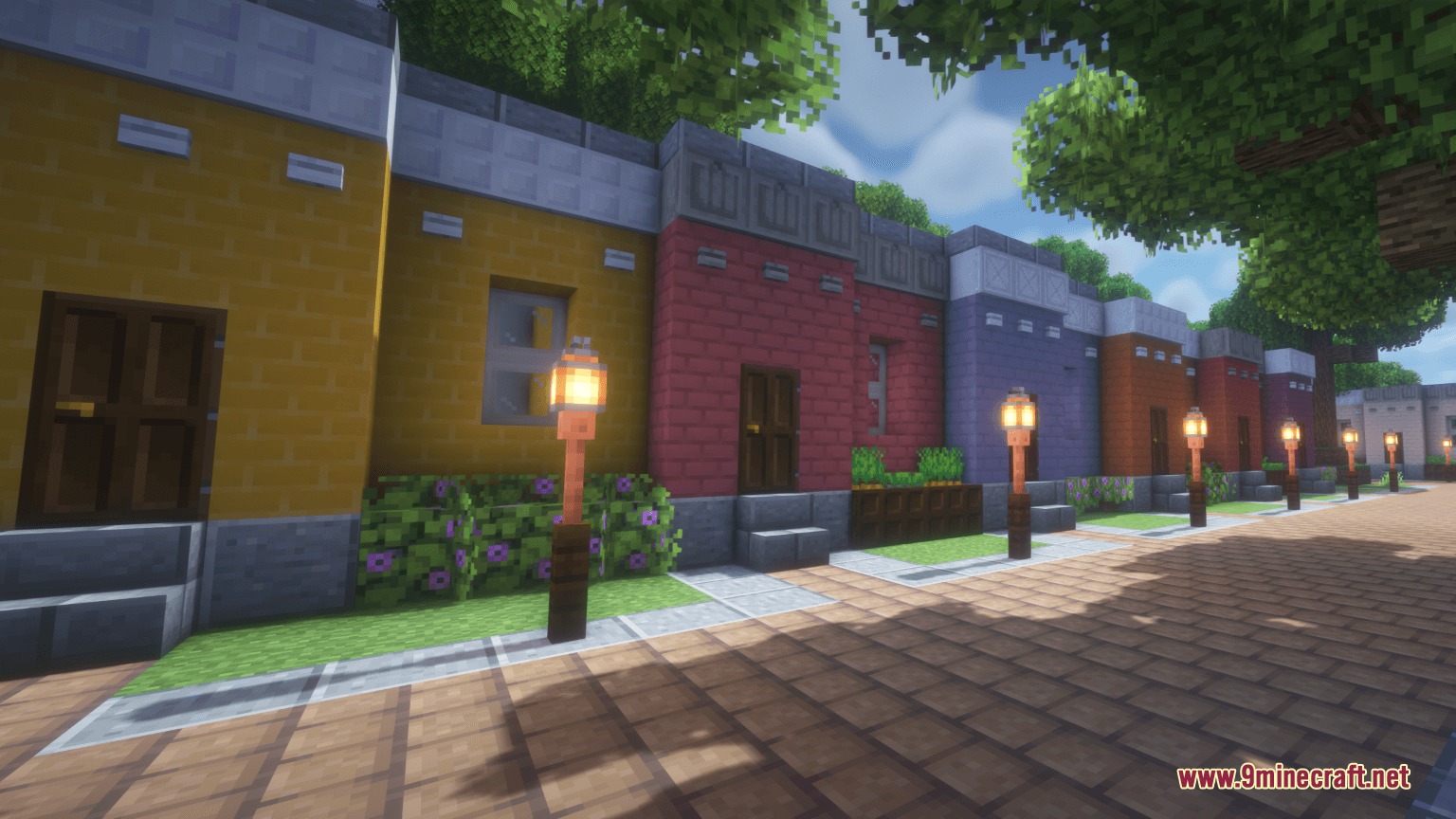Prismatic Masonry Construction Mod Screenshot 2 A row of colorful brick houses with lanterns along a paved street