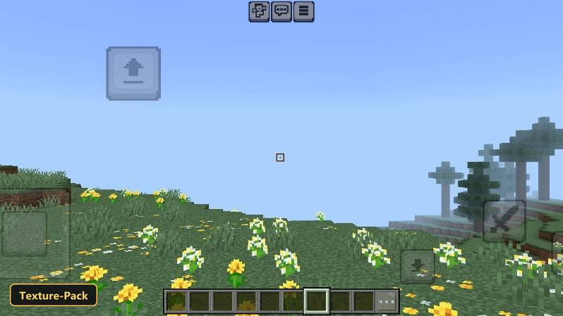 Grassy hillside with yellow and white flowers, small square crosshair