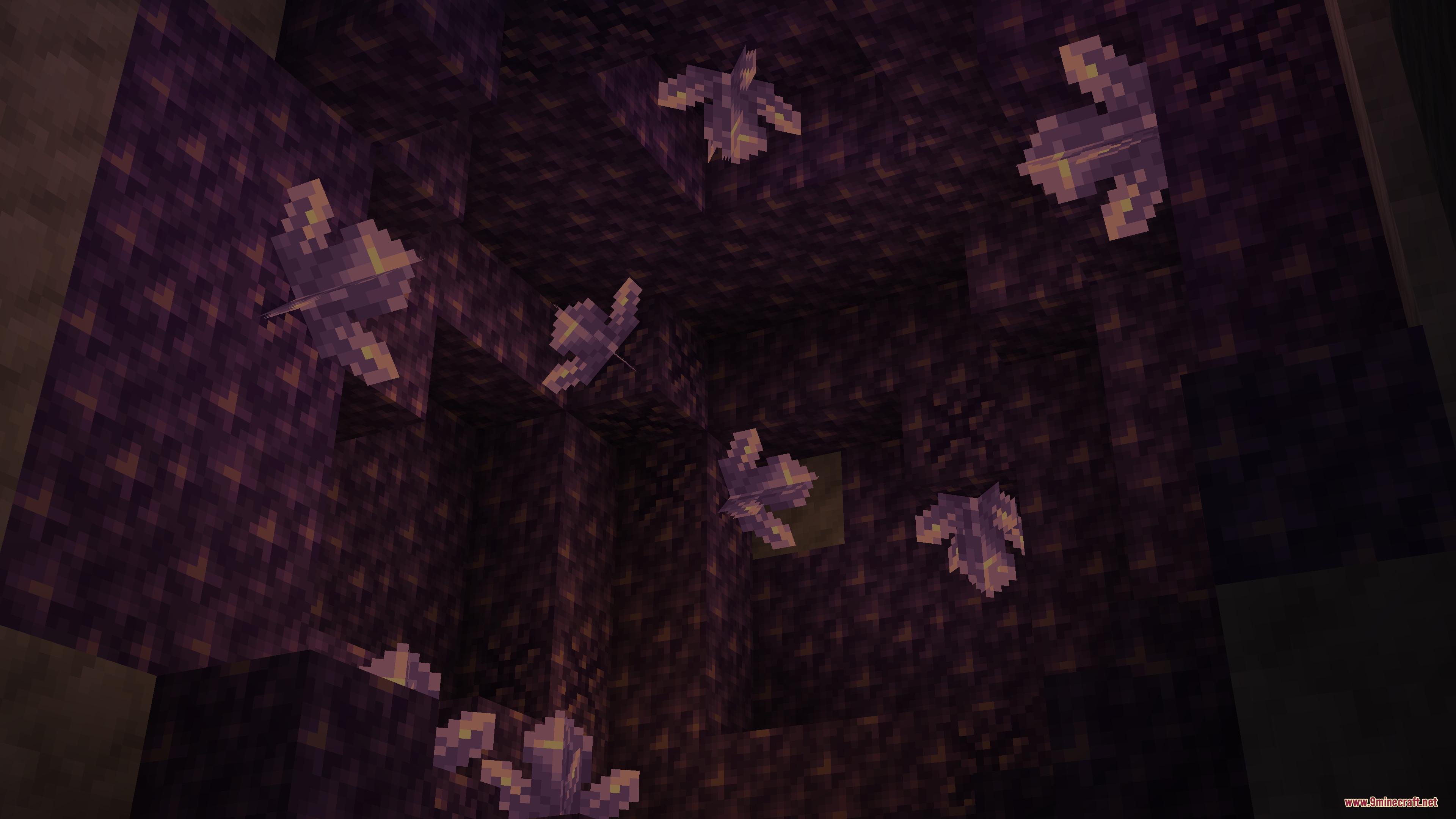 Amethyst clusters casting a deep purple glow inside a dark underground geode