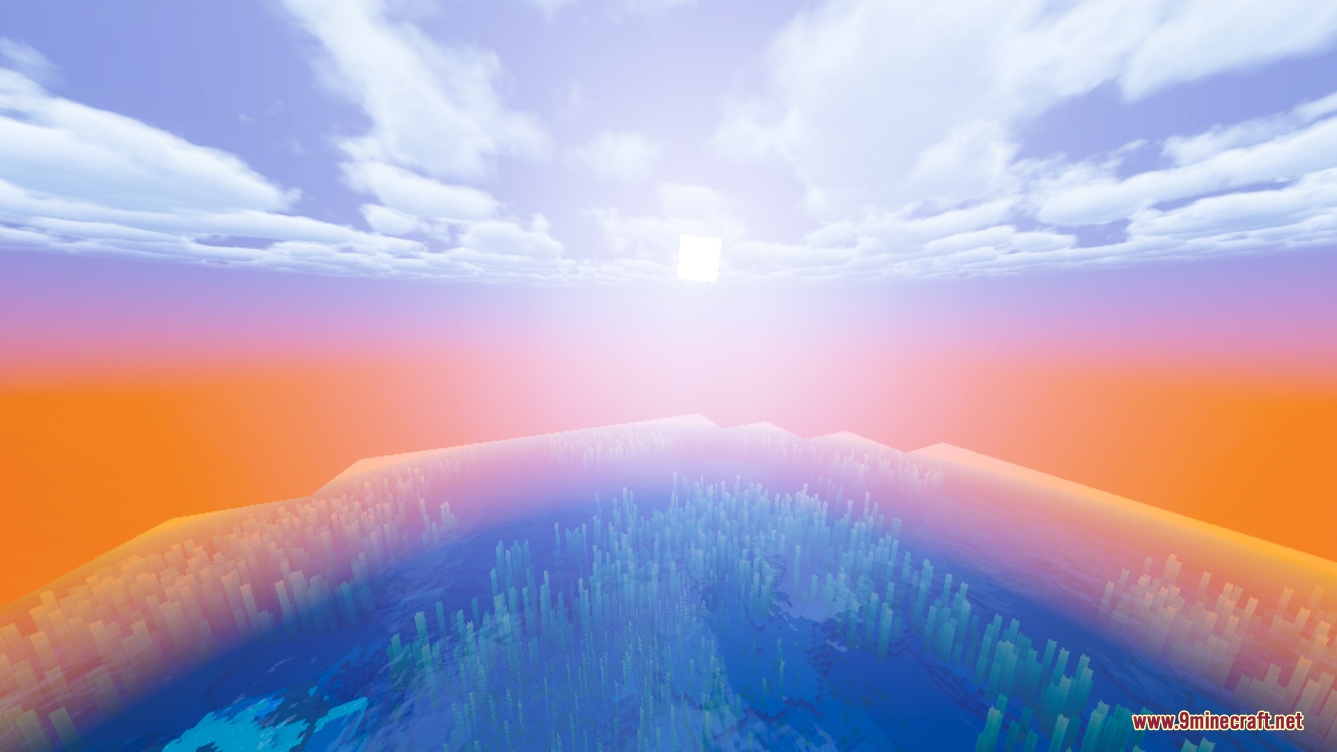 Vibrant sunset lighting up the sky over a frozen ocean biome