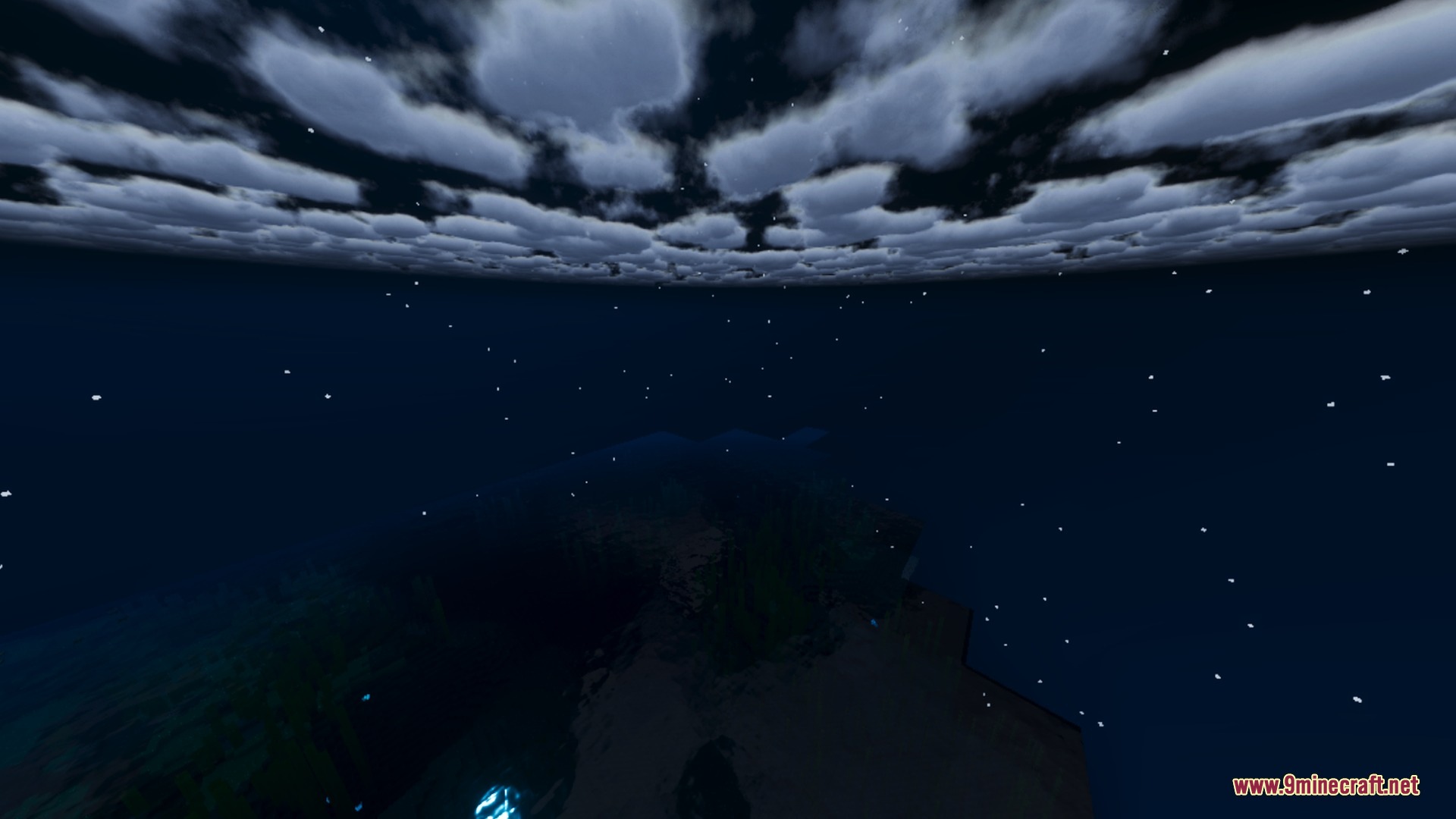 Realistic dark clouds and twinkling stars visible in the night sky