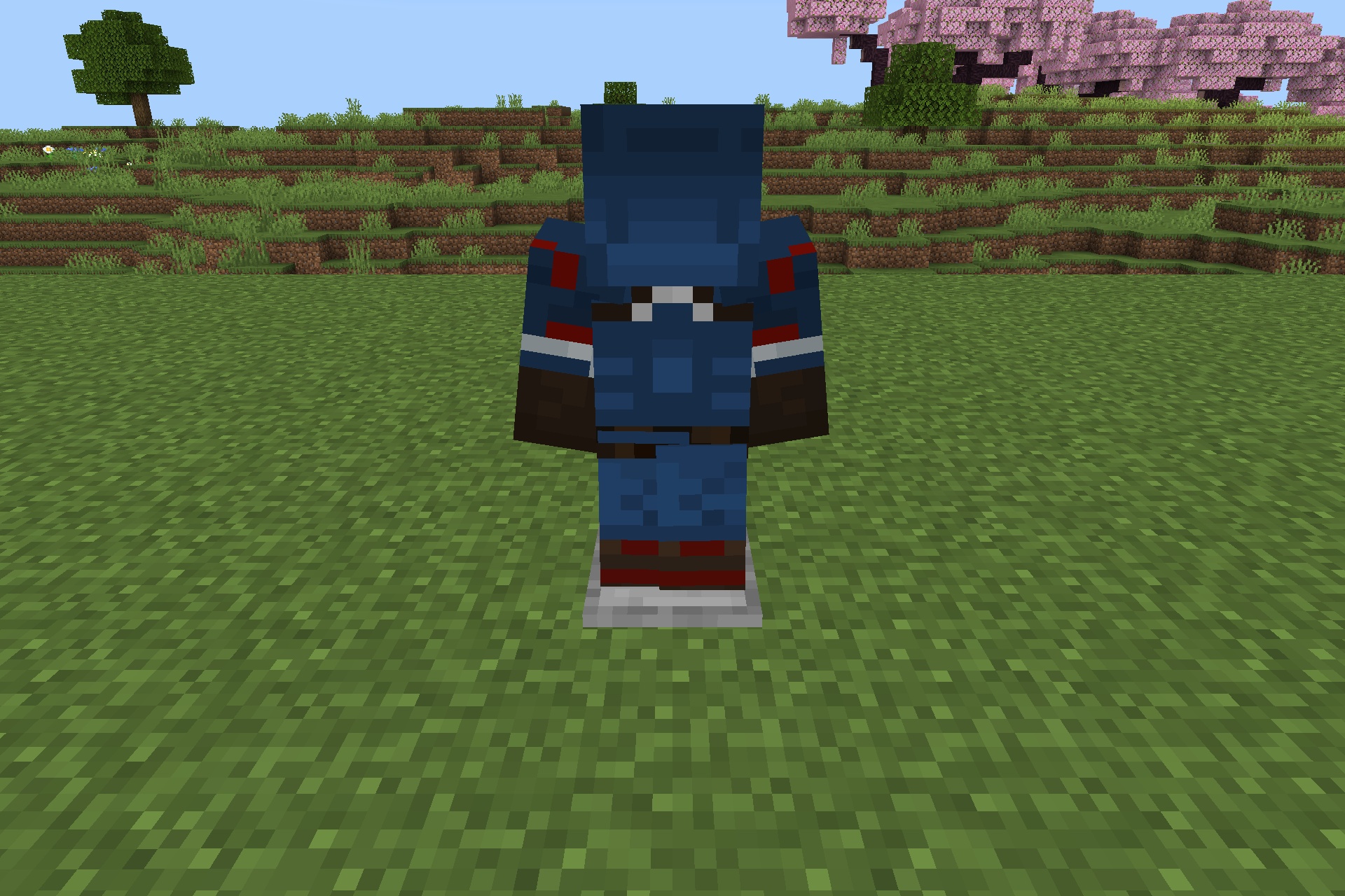 Blue superhero armor on a stand with cherry blossom trees in the background
