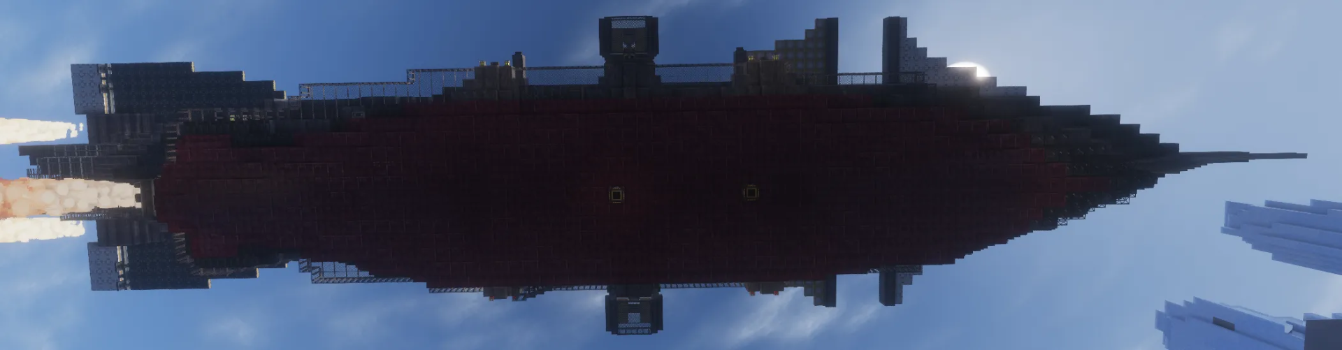 Red Airship Schematic Screenshots 1 Underside view of a long red and black airship against a blue sky
