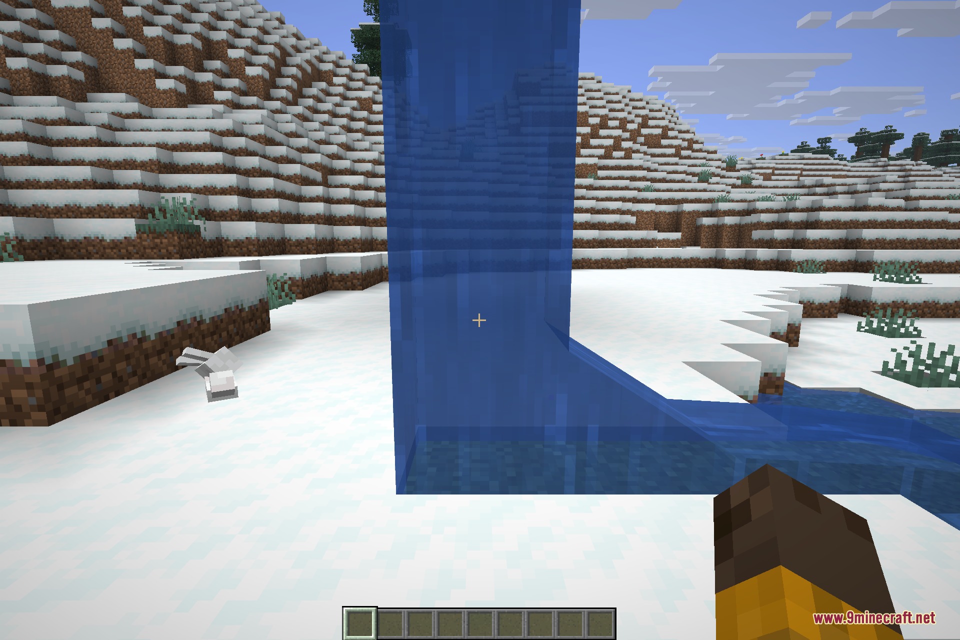 Redirected 9minecraft Mod Screenshot 6 A vertical stream of water flowing down onto snowy ground with a rabbit