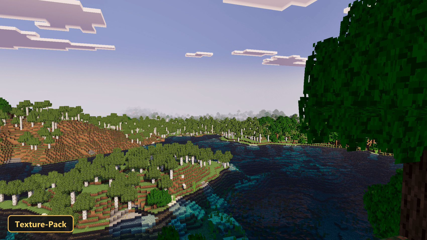 Wide river winding through a forest of birch and other trees