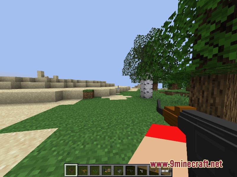 Relic Firepower Mod Screenshot 4 Player holding an assault rifle near a birch tree in Minecraft
