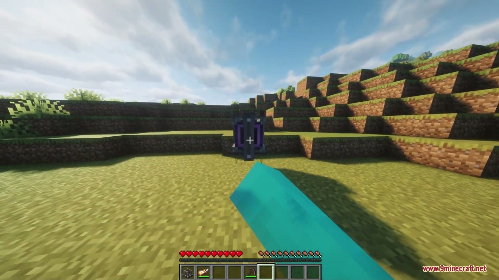 Rotational Surface Anchor Mod Screenshot 1 Player holding a blue mechanical tool while facing a rotational surface anchor block