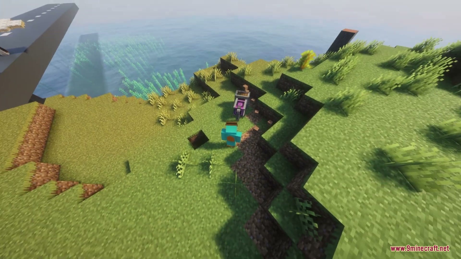 Rotational Surface Anchor Mod Screenshot 5 A player interacts with a mechanical handle on a grassy cliffside near water