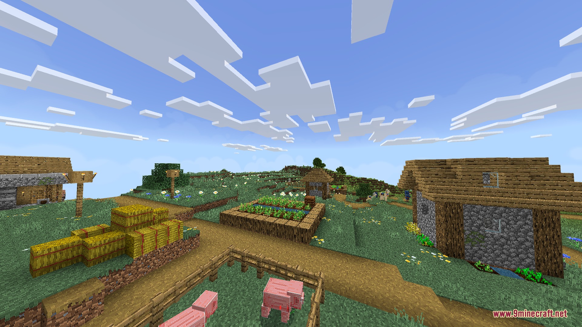 Clean and vibrant village landscape with hay bales and farm animals