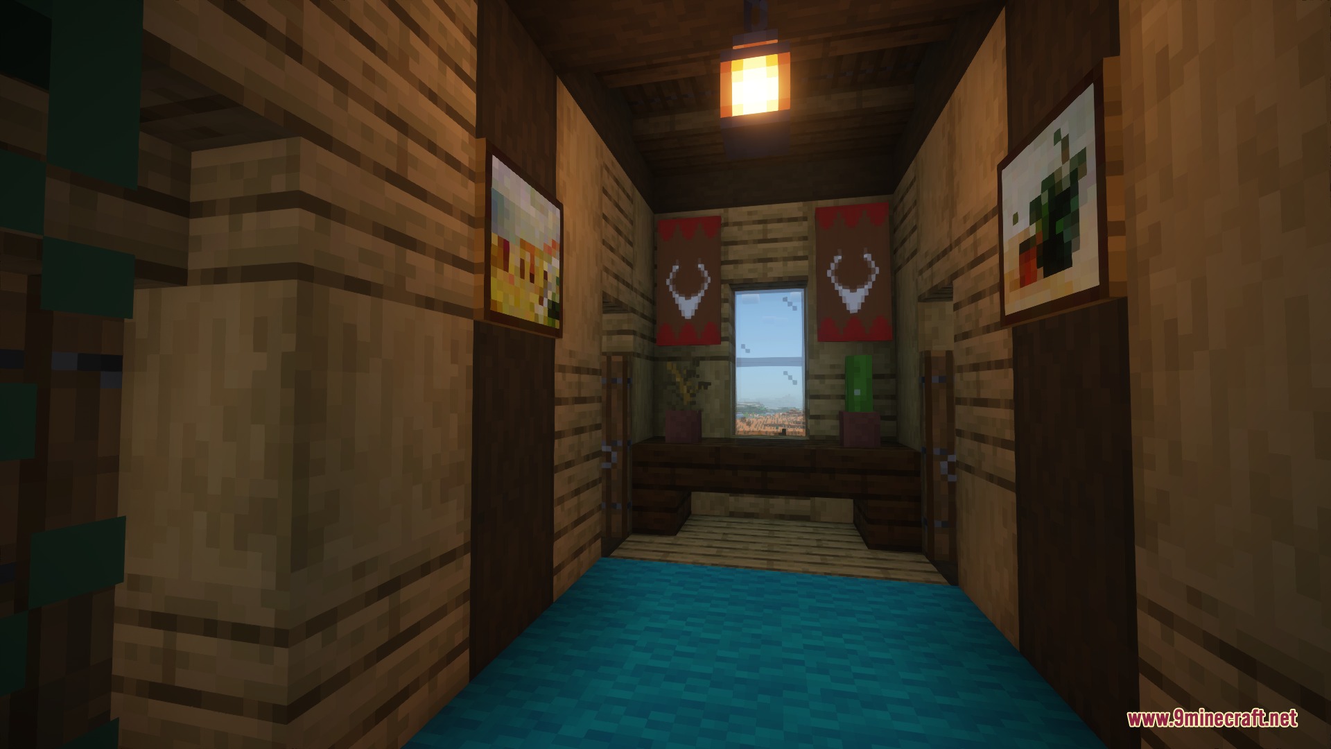 Upper hallway with blue carpet and paintings leading to villager rooms
