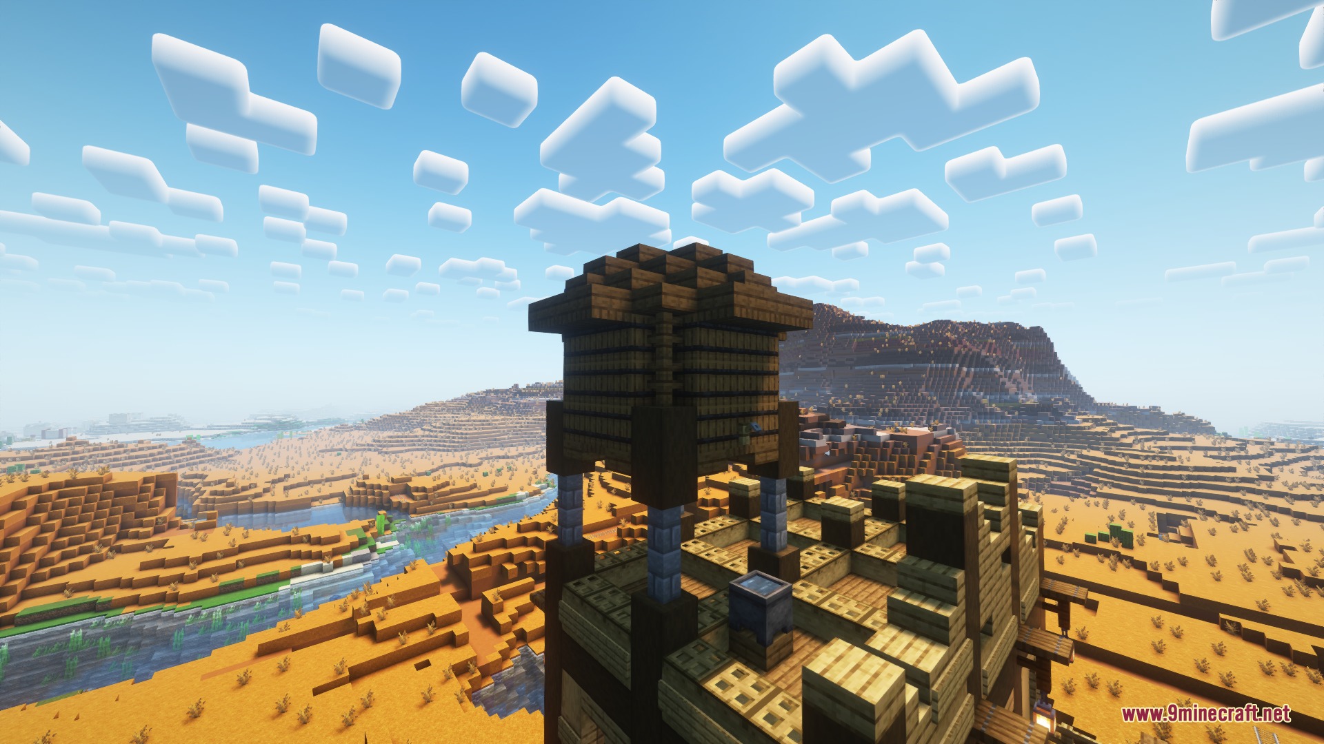 Wooden water tower standing tall on the roof of the desert outpost