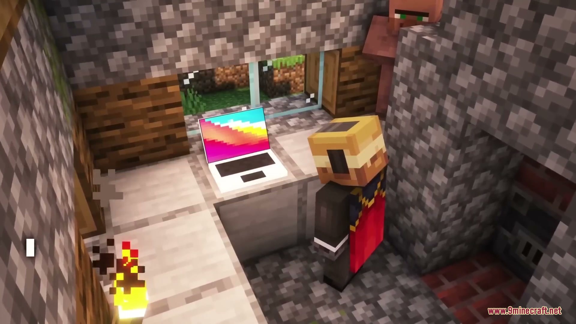 Sleek Living Spaces Mod Screenshot 1 A Minecraft character looks at a modern laptop on a white desk