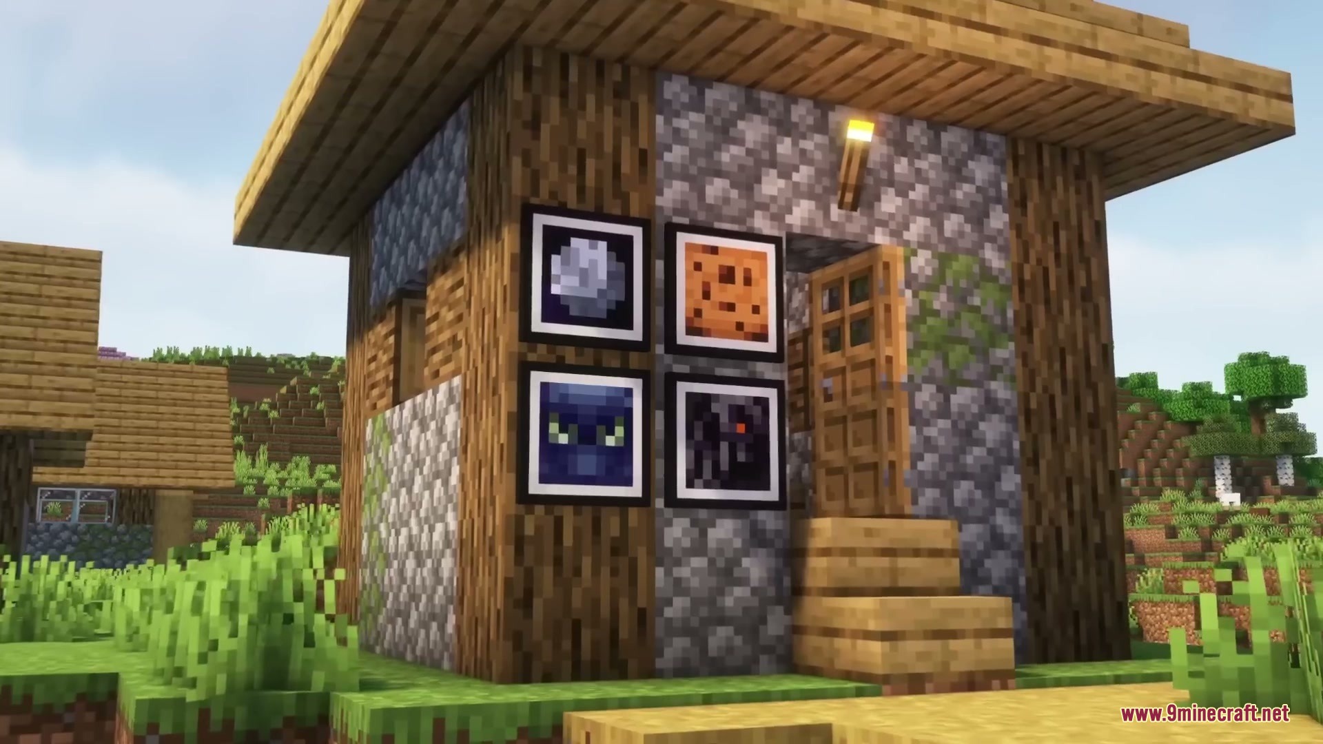 Sleek Living Spaces Mod Screenshot 13 A small Minecraft house decorated with several posters on the exterior wall