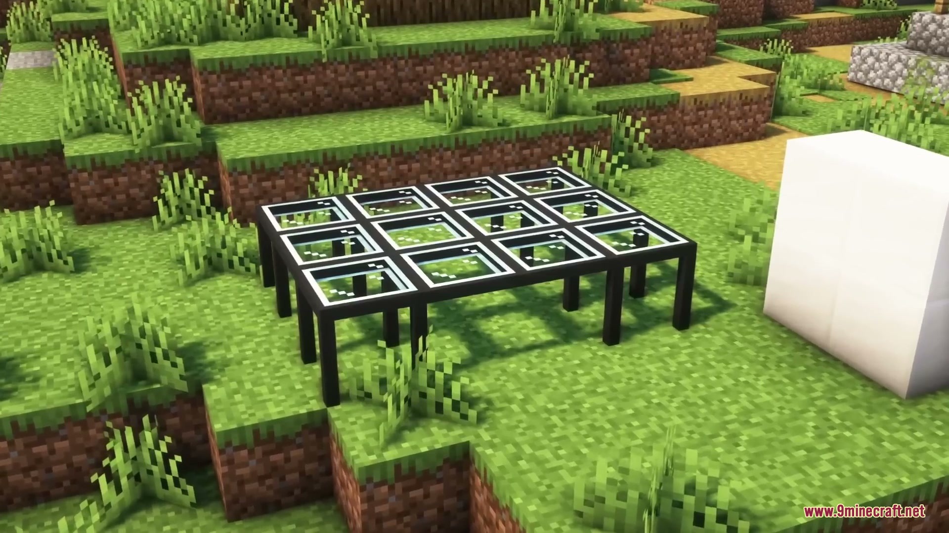 Sleek Living Spaces Mod Screenshot 16 A modern glass table with black legs placed on a grassy hill