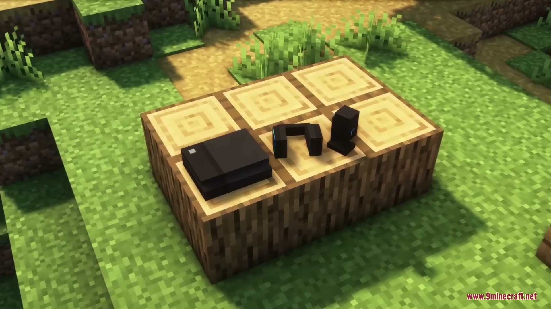 Sleek Living Spaces Mod Screenshot 17 A black gaming console and accessories placed on top of wooden logs