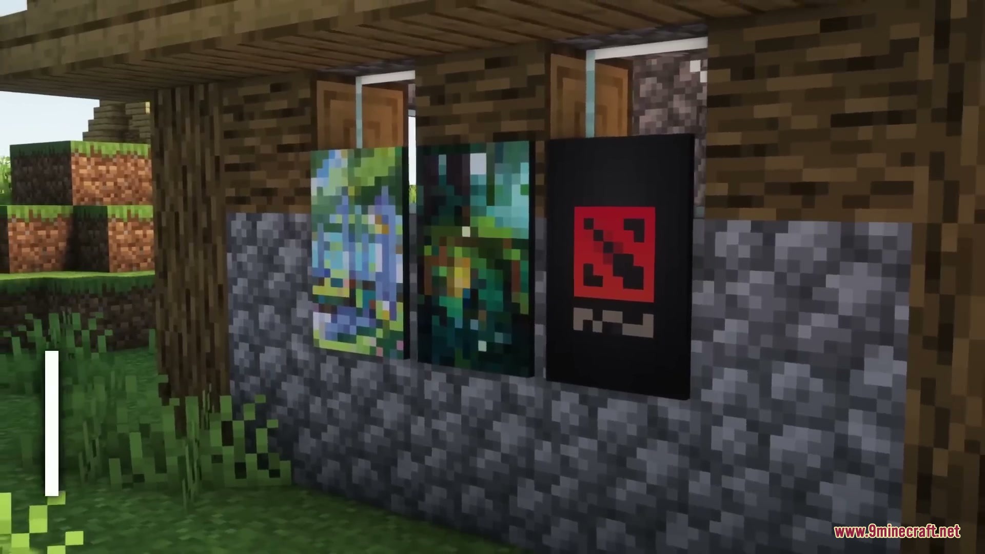 Sleek Living Spaces Mod Screenshot 2 Three colorful posters displayed on the side of a cobblestone building