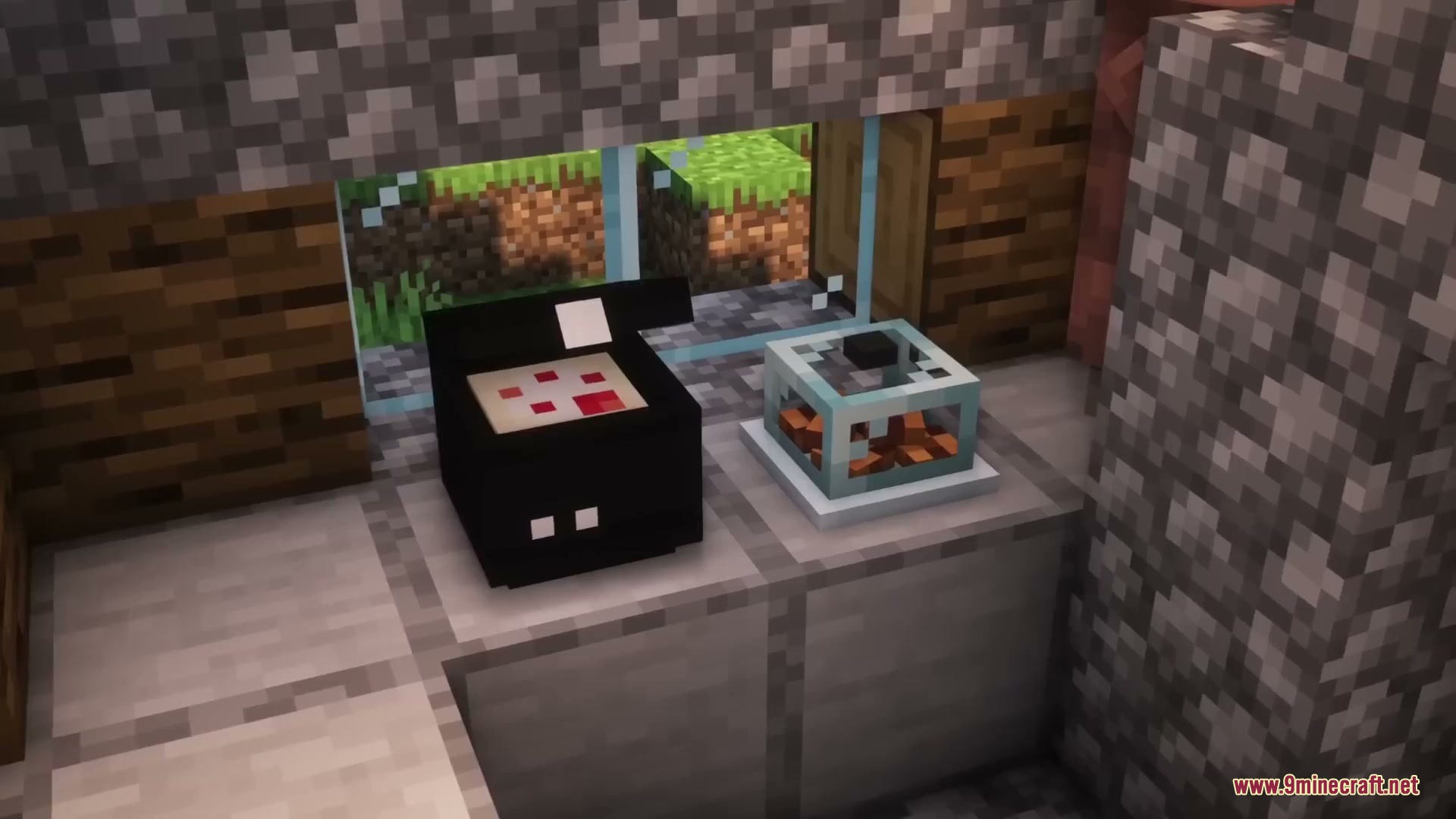 Sleek Living Spaces Mod Screenshot 8 A black electronic device and a food display case on a counter
