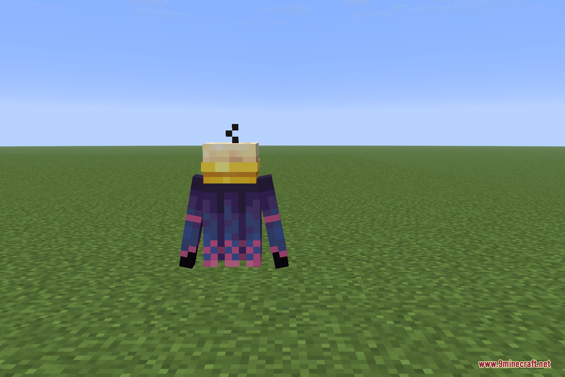 Species 9minecraft Mod Screenshot 10 A colorful patterned creature with a yellow head stands on green grass