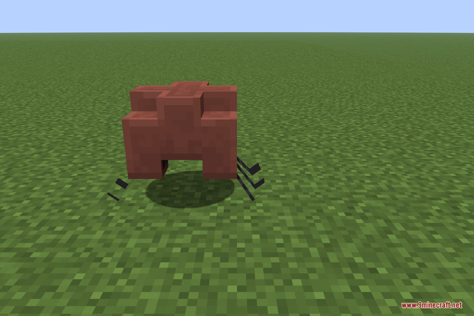 Species 9minecraft Mod Screenshot 12 A small reddish brown Cruncher creature crawling on the green grass