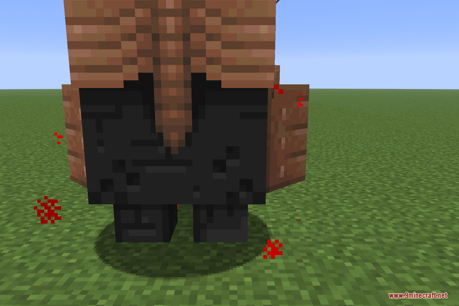 Species 9minecraft Mod Screenshot 8 Close up of a dark blocky creature with red particles on grass