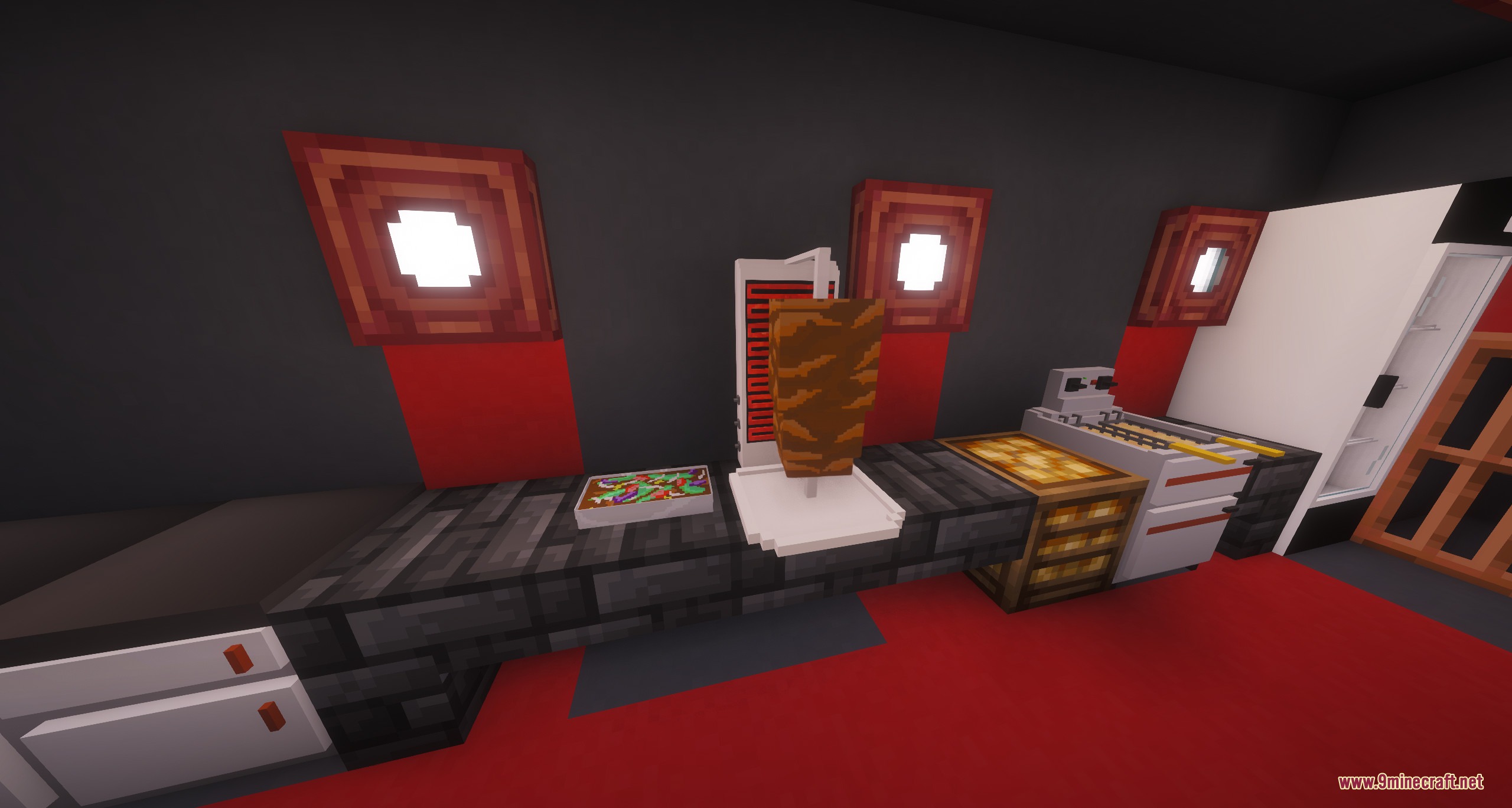 Spit Roasted Sizzles Mod Screenshot 4 Kitchen interior showing a functional meat grill and a deep fryer