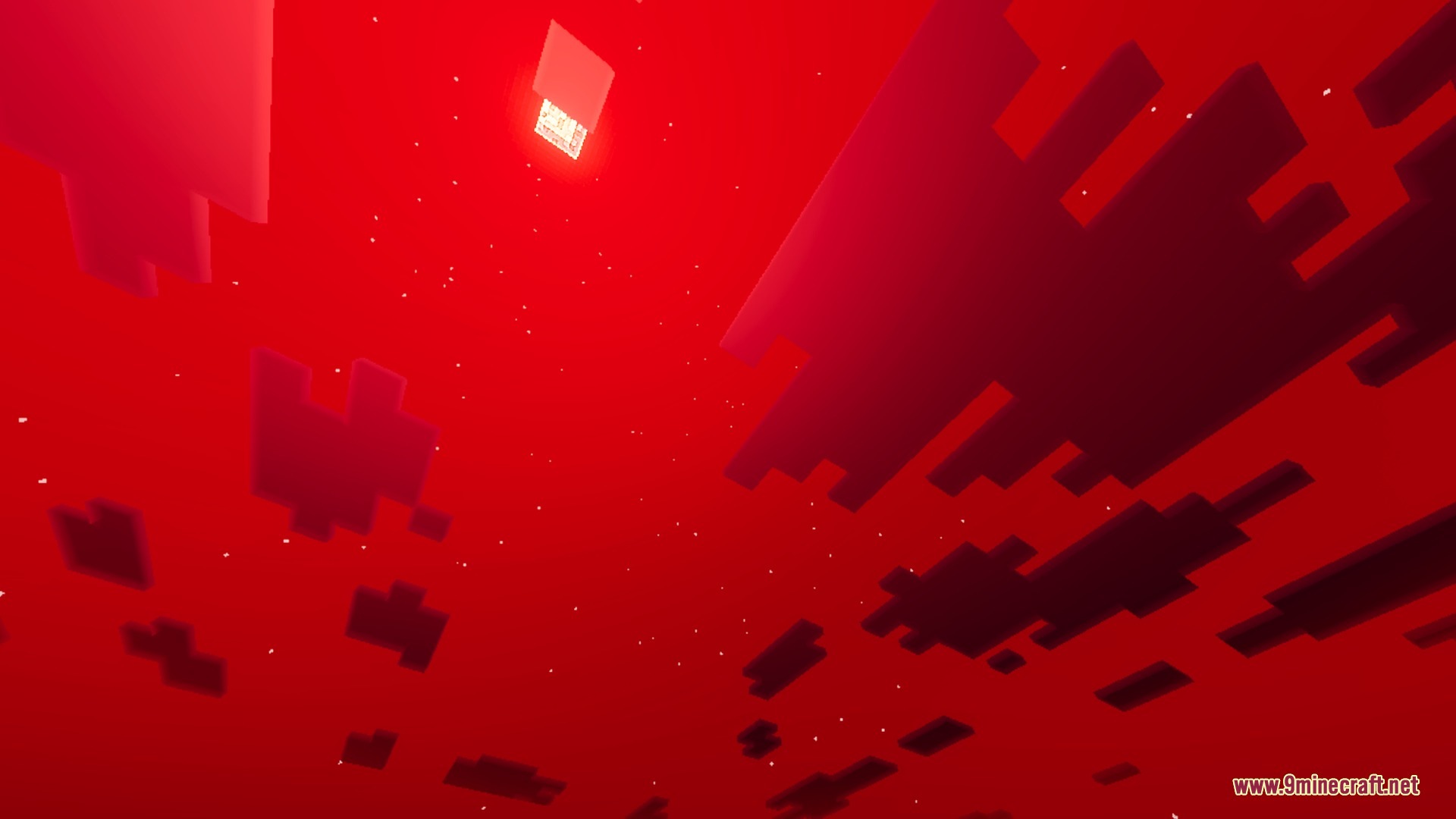 The sun shines through a dark red sky filled with blocky clouds