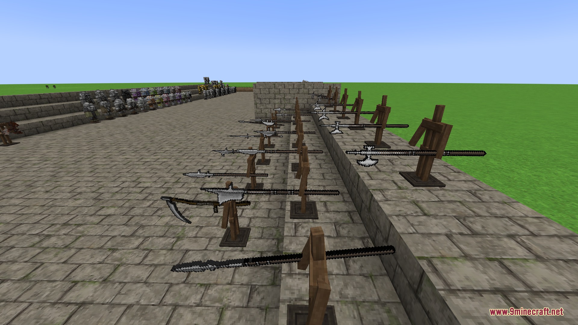 A long row of medieval polearms and spears displayed on wooden stands