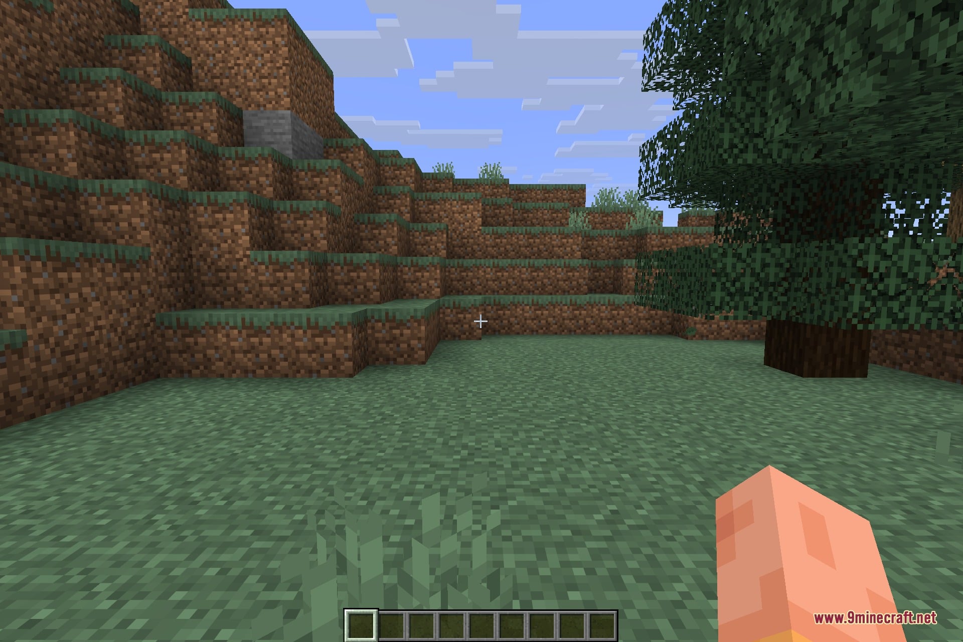 The identical hillside in an unmodified world, shown for comparison